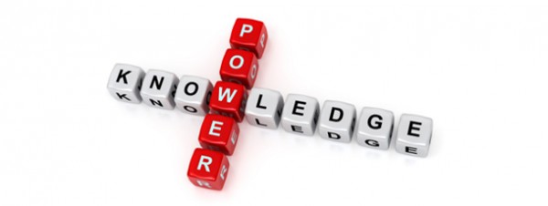 Scrabble tiles spelling 'power' and 'knowledge'