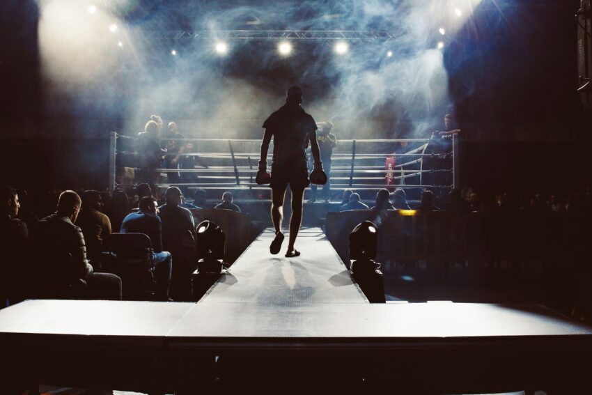 man entering boxing ring