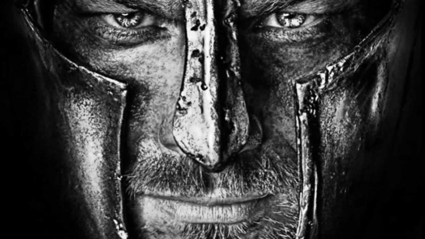 The face of a gladiator wearing a helmet