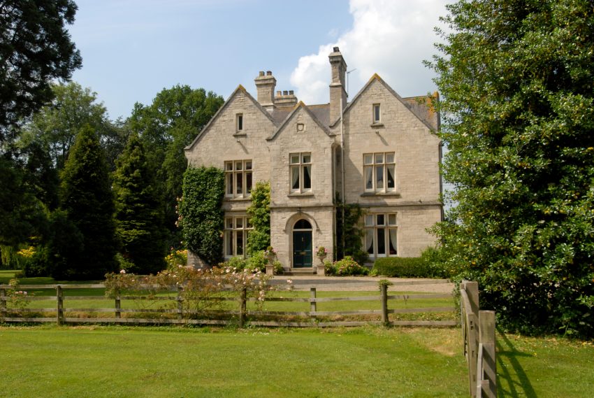 Front external view of period property in rural setting