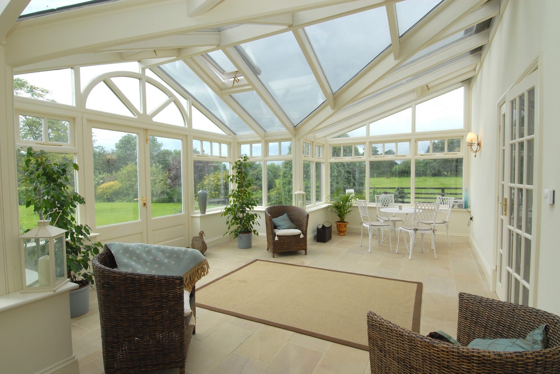 Large conservatory looking out towards a garden