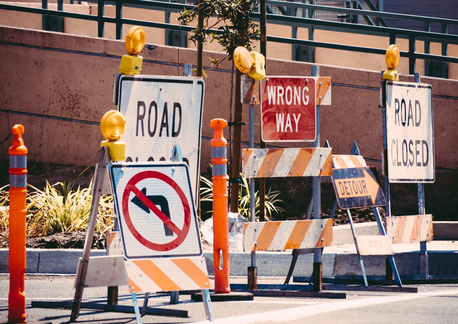 Road closed signage blocking access to a road