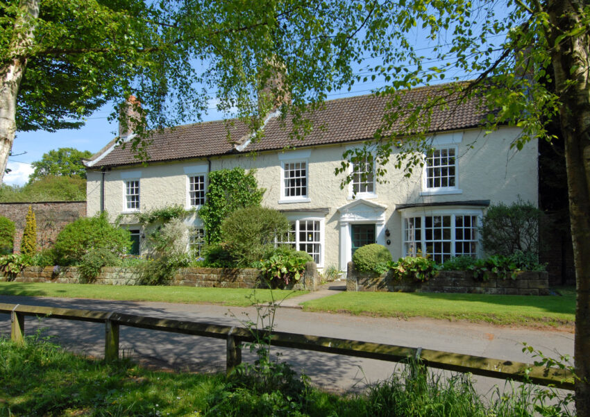 Large house surrounded by trees